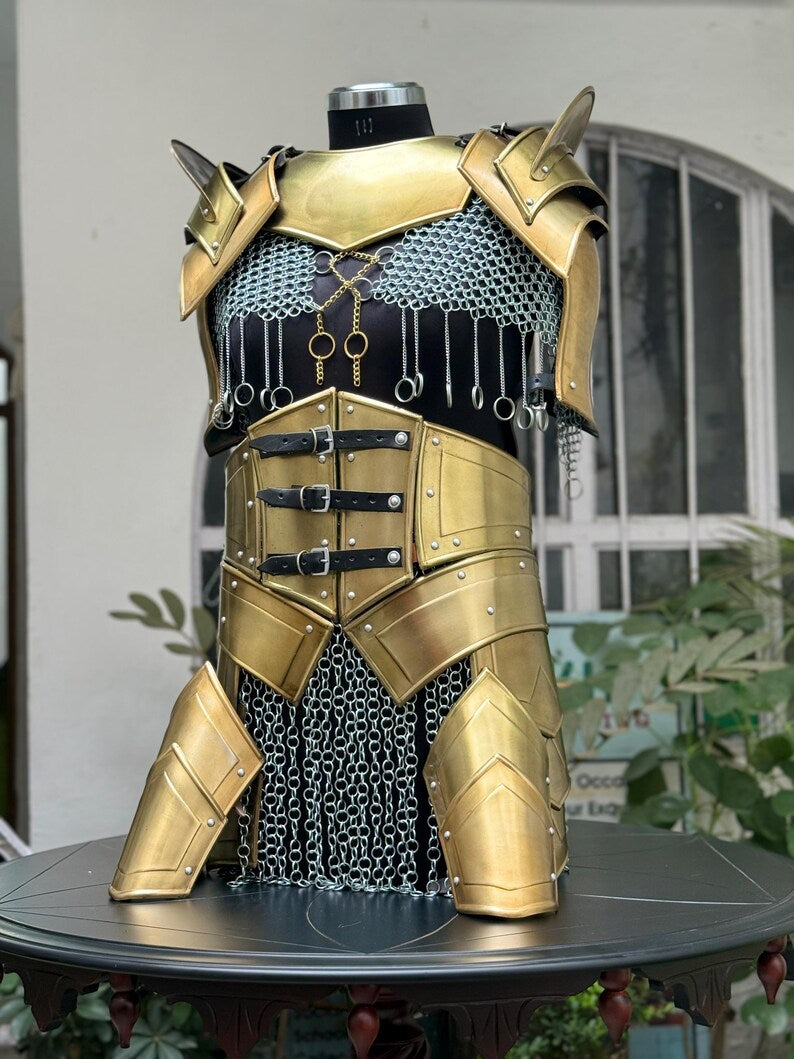 Cosplay armor set for women featuring black chainmail top and steel shoulder guards