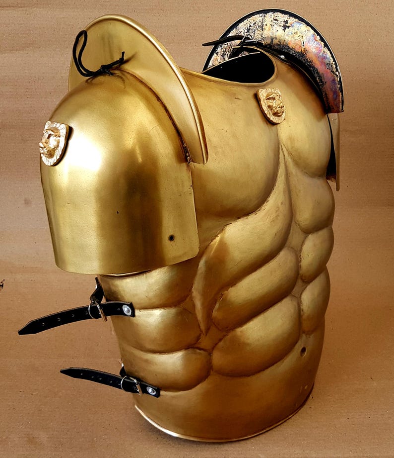 Cosplay gladiator armor featuring lion detail on gold brass Roman muscle cuirass