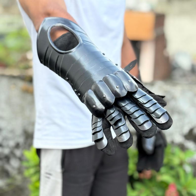 Dark fantasy cosplay gauntlets with articulated spiked fingers from Shadowsteel Gothic collection