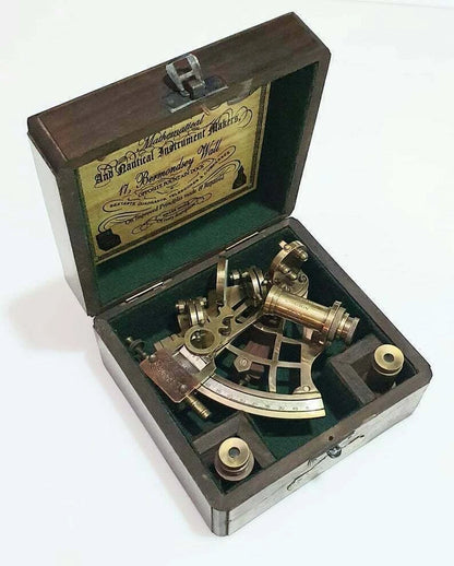 Decorative nautical sextant collectible with antique brass finish and wooden case


