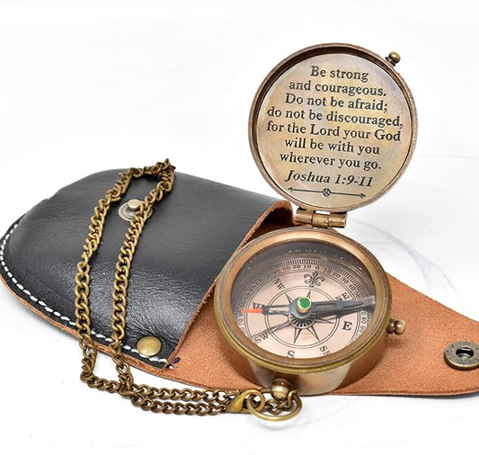 Handcrafted brass compass engraved with Joshua 1:9 scripture verse for encouragement.

