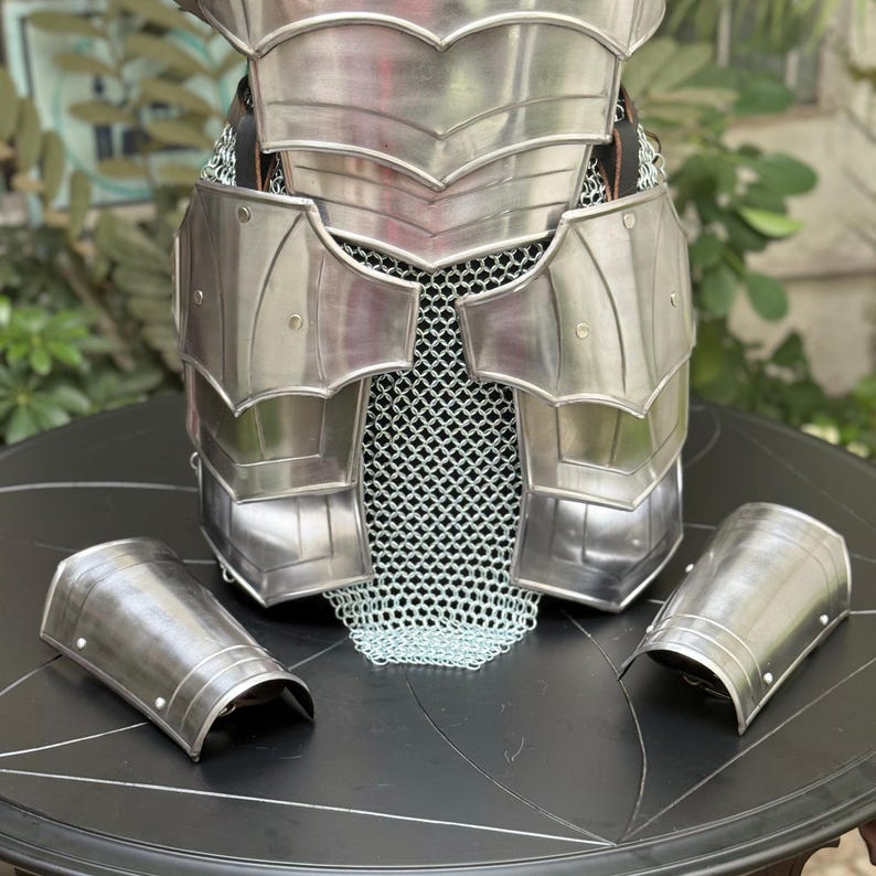 Fantasy LARP costume featuring medieval cuirass and adjustable leather straps for women