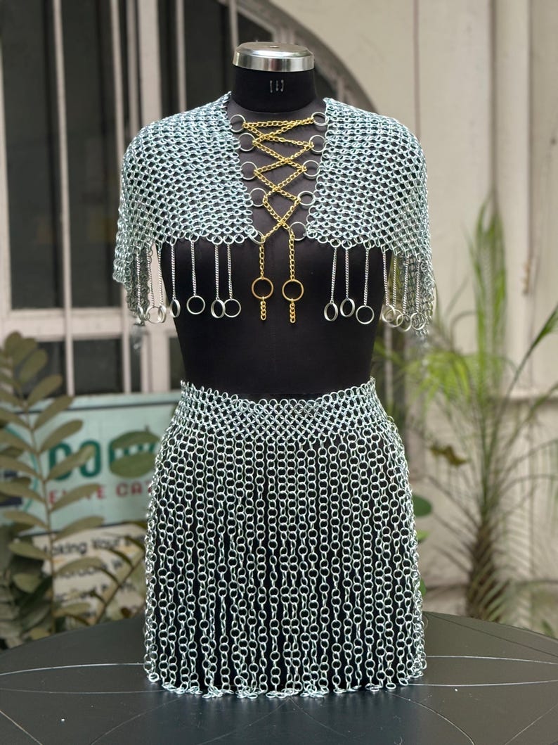 Festival-ready chainmail outfit in golden Valkyrie style with silver accents and bold layered design