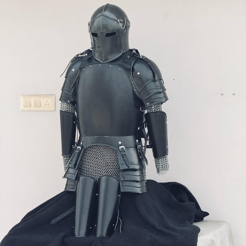 Back view of full body steel knight armor with leg greaves and leather strap fittings for LARP use.