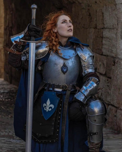 Side view of the full leg armor set including cuisses, poleyns, and greaves, custom-fitted for a female knight silhouette.

