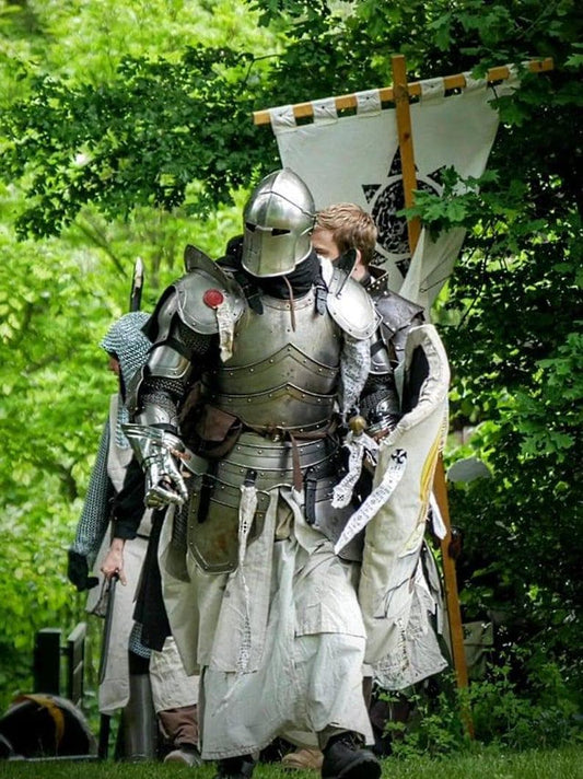 Complete medieval knight armor set made from 18 gauge steel with cuirass, tassets, and helmet.

