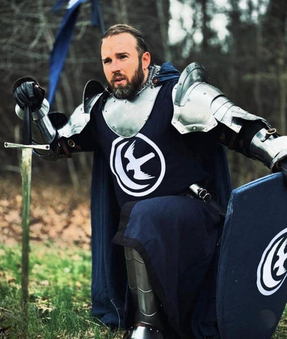 Detailed view of the cuirass and tassets with articulated lower plate protection, designed for full torso and thigh coverage.

