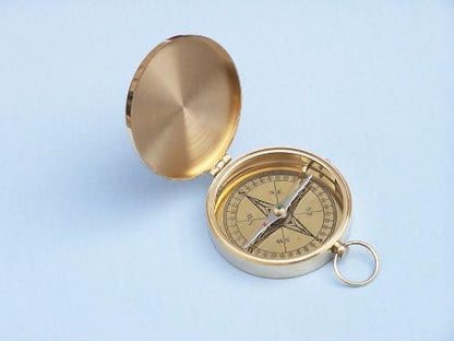 Fully functional solid brass compass with secure hinged lid on rosewood box