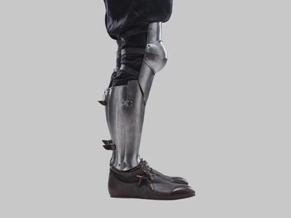 Gothic medieval leg armor greaves made of 18 gauge mild steel designed for knight cosplay and Renaissance fairs