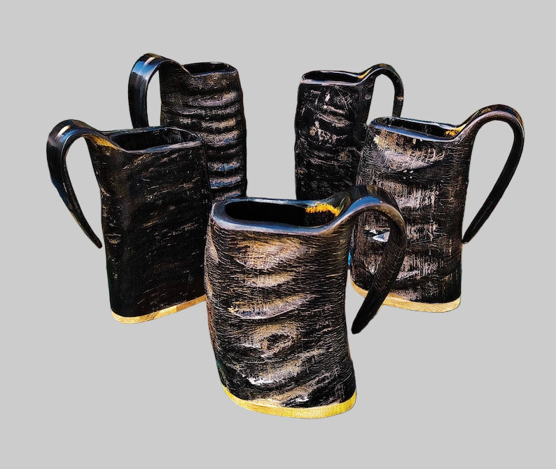 Set of four handcrafted horn mugs made from natural water buffalo horn