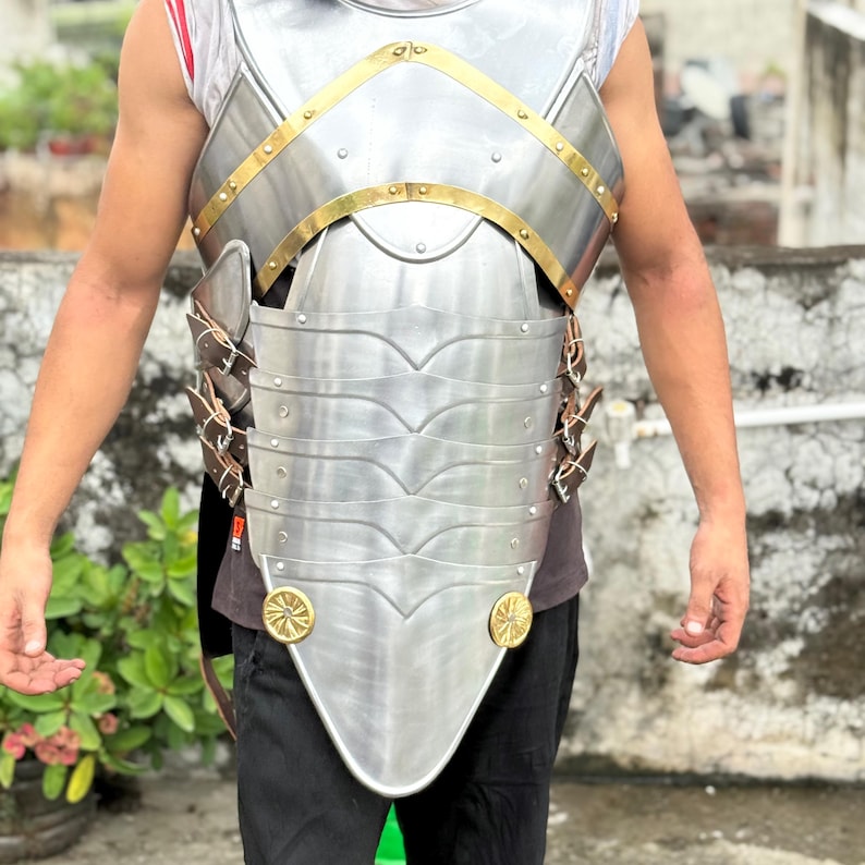 Handcrafted medieval knight armor cuirass displayed in a collector’s showcase