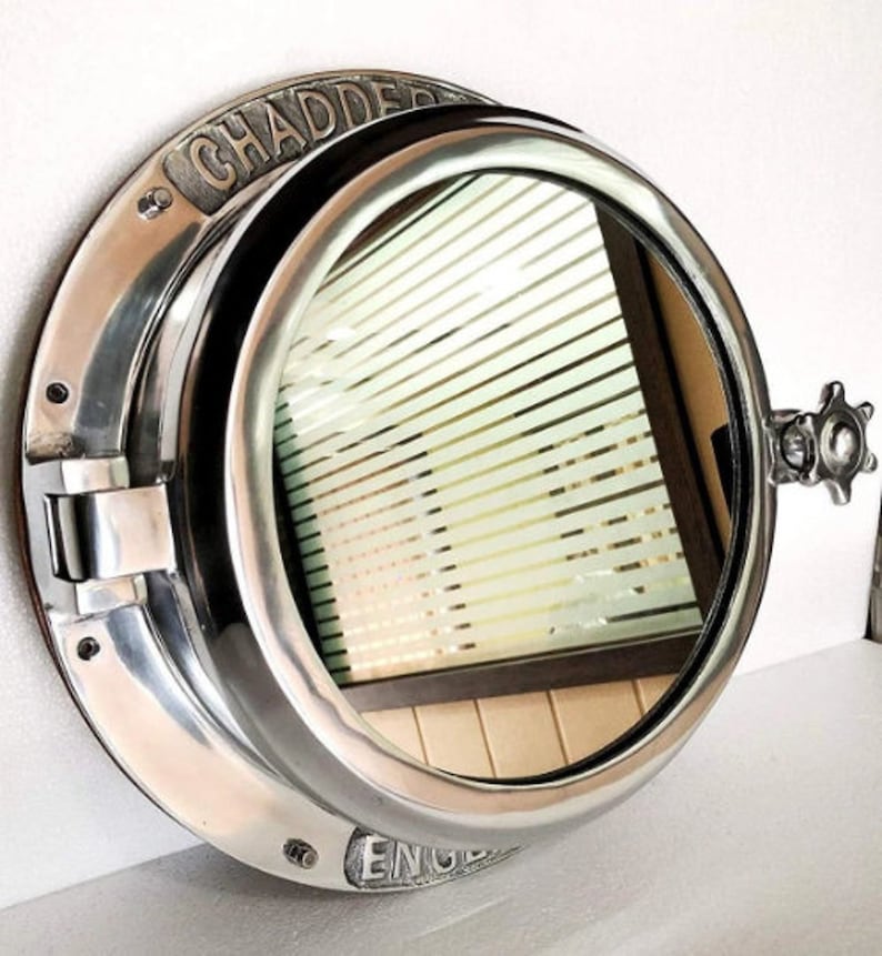 Handcrafted nautical mirror with working hinged porthole design