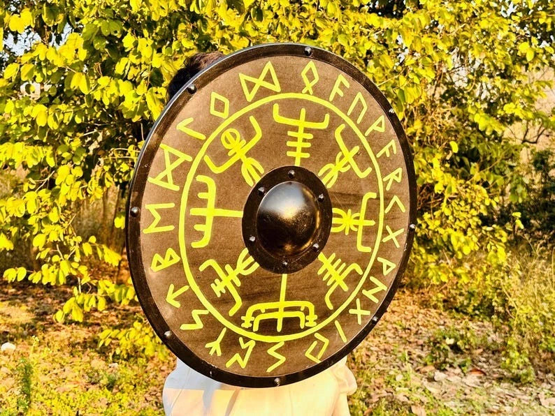 Viking shield mounted on wall as decorative medieval home accent