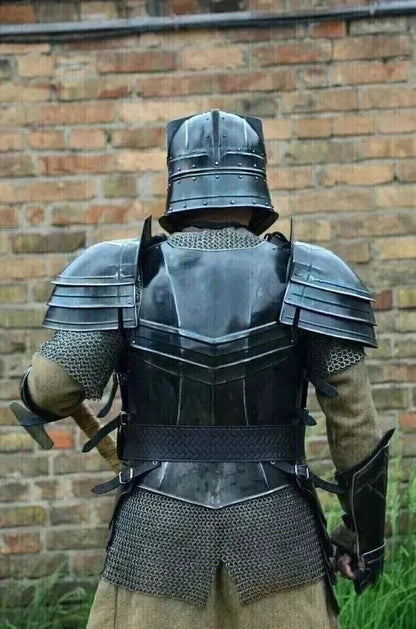 Detailed view of the chest plate and pauldrons from the Dwarf Moria knight armor suit, handcrafted from polished 18 gauge steel.


