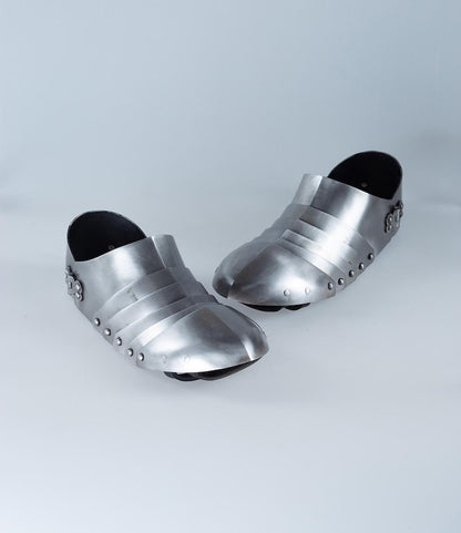 LARP-ready Milanese sabatons foot armor on display with rolled edges