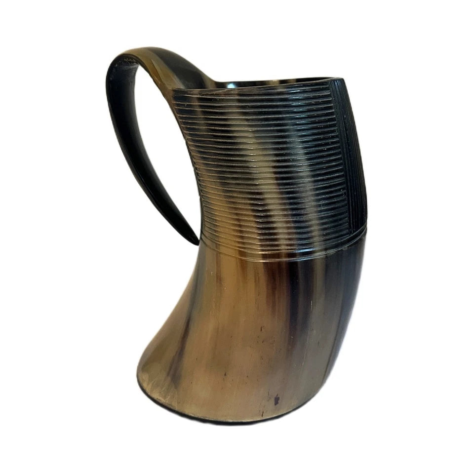 Medieval ale drinking mug made from natural carved horn