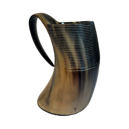 Medieval ale drinking mug made from natural carved horn