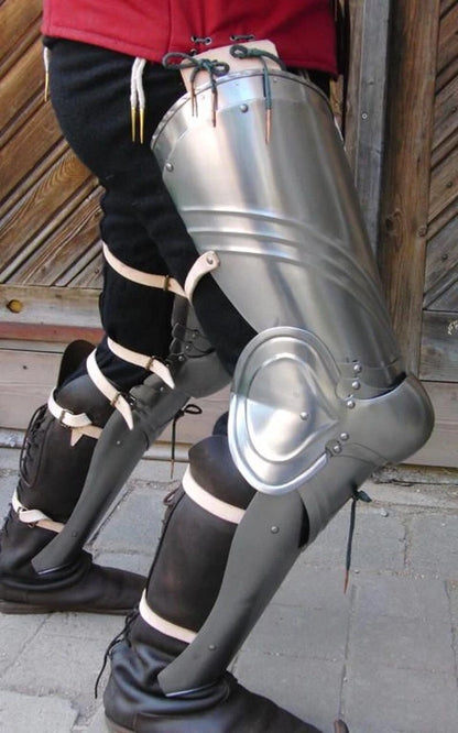 Side view of handcrafted medieval steel leg armor for cosplay and reenactment