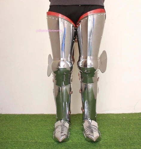 Person wearing medieval gothic full leg guard armor set for cosplay or costume event