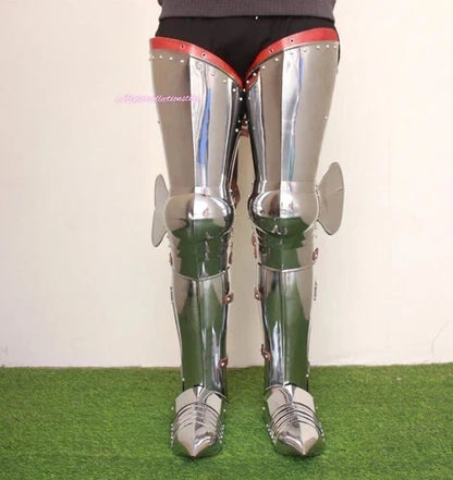 Person wearing medieval gothic full leg guard armor set for cosplay or costume event
