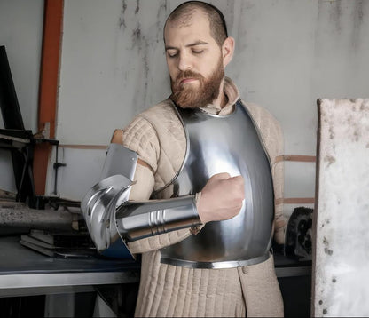 Medieval knight armor featuring steel arm and elbow guards for historical reenactment and Renaissance fairs