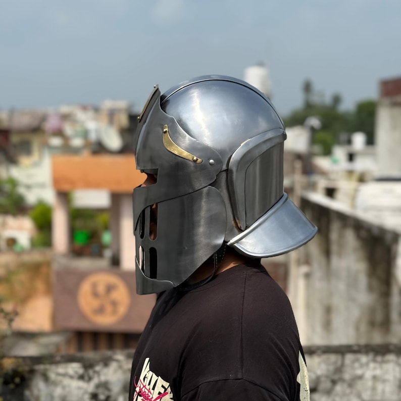 Handcrafted medieval knight helmet worn at Renaissance fair cosplay event featuring Visor of Aegis Prime