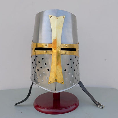 Medieval knight helmet featuring iconic red Templar cross design