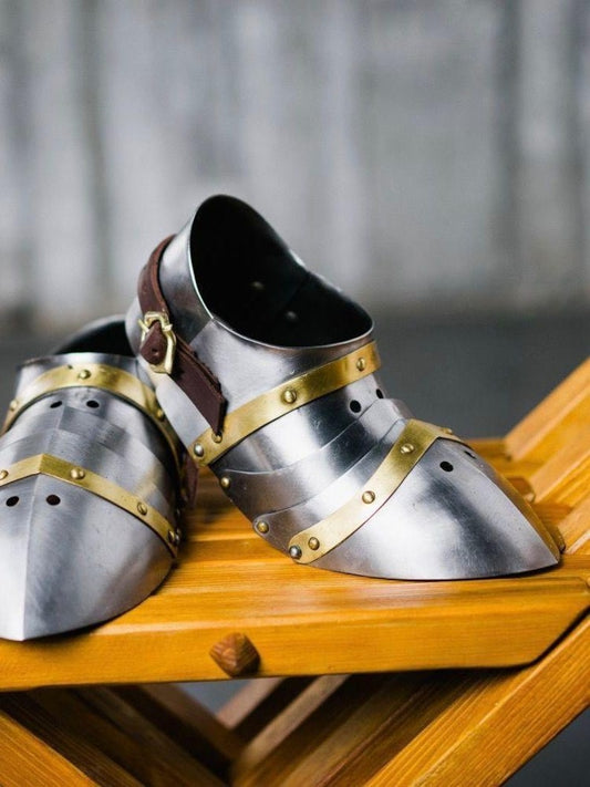 Side view of medieval knight steel brass sabatons with detailed finish for LARP and cosplay

