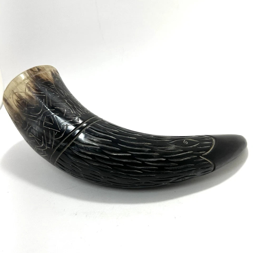 Medieval LARP drinking horn decorated with intricate handmade carvings