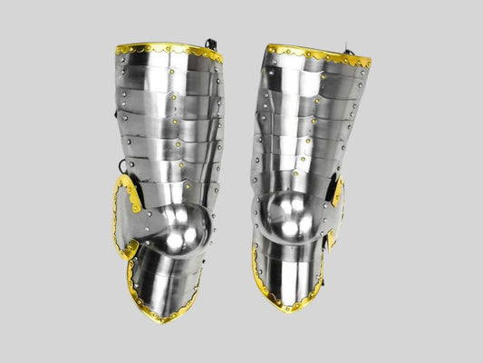 Front view of Medieval Polish Winged Hussar Leg Armor Set in 16 gauge steel with brass trim


