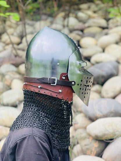 Side profile of the Medieval Roa Bascinet Helmet showcasing the attached chainmail and silver finish.