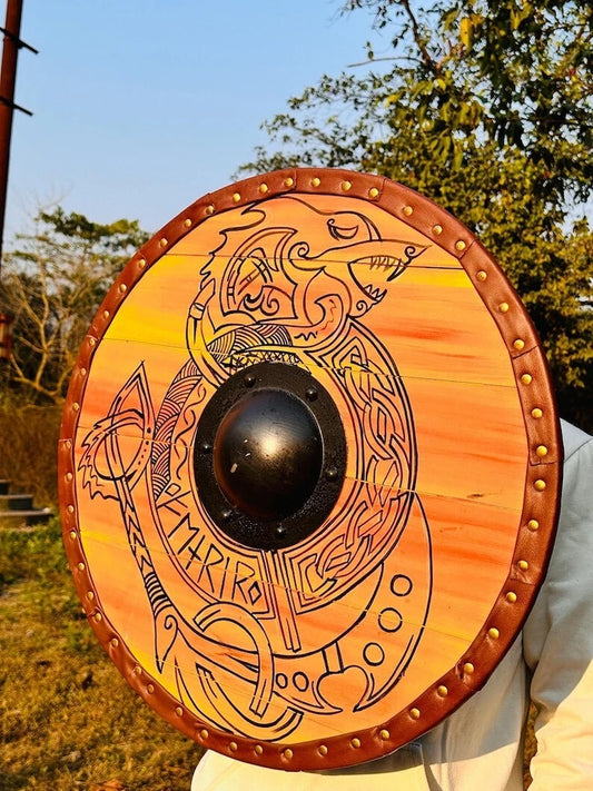 Back of wooden Viking shield showing leather arm straps for wearing