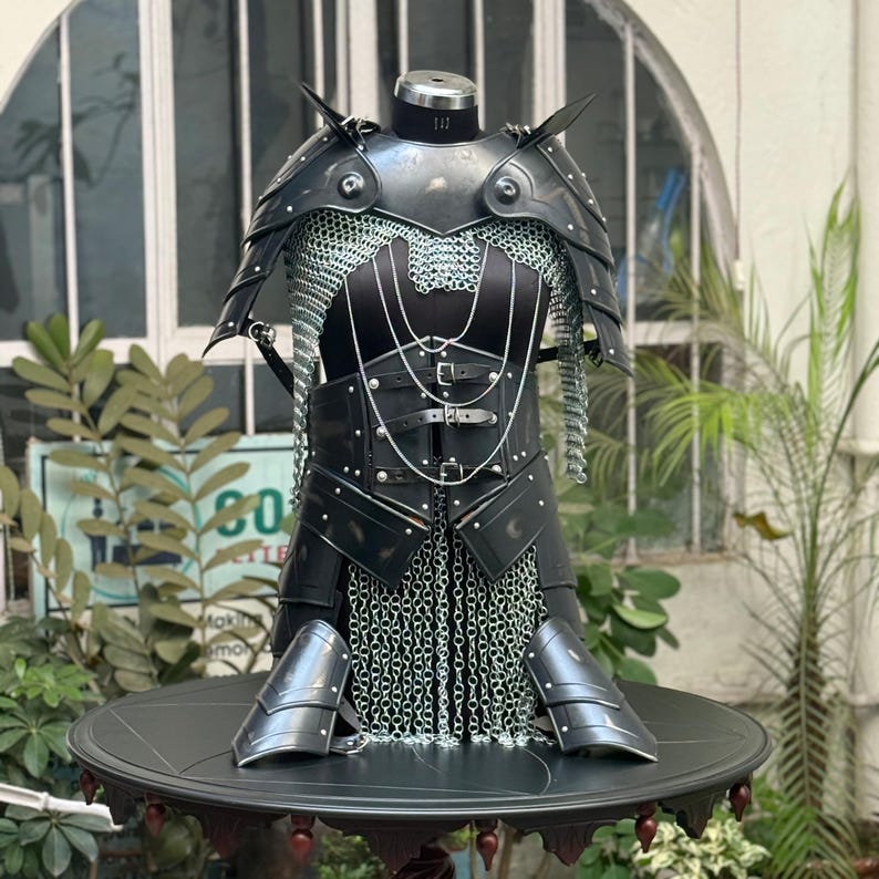 Front view of Medieval Women’s Black Cuirass Armor Set featuring chainmail, gorget, and pauldrons