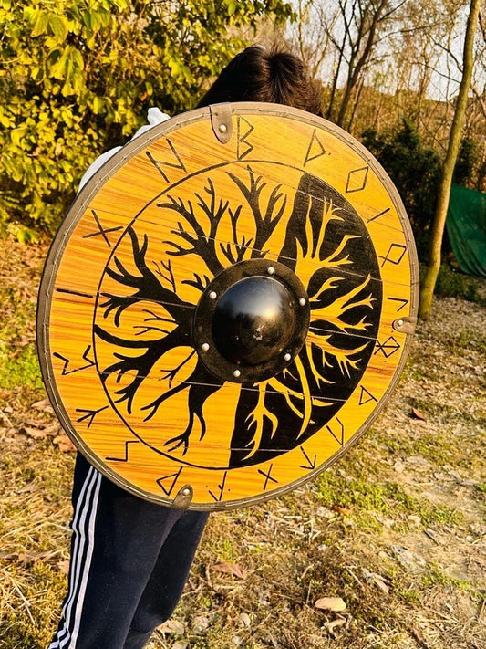 Back side of Viking shield showing leather straps for costume wear
