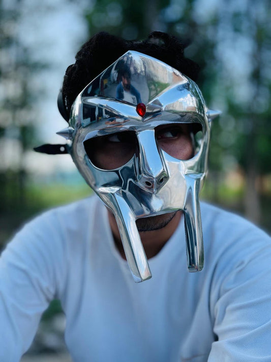 Limited edition MF DOOM mask with polished brass finish and gladiator design