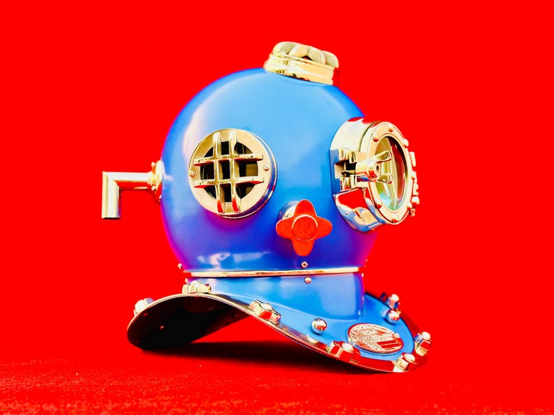 Nautical maritime decor featuring deep sea divers helmet as tabletop decorative piece