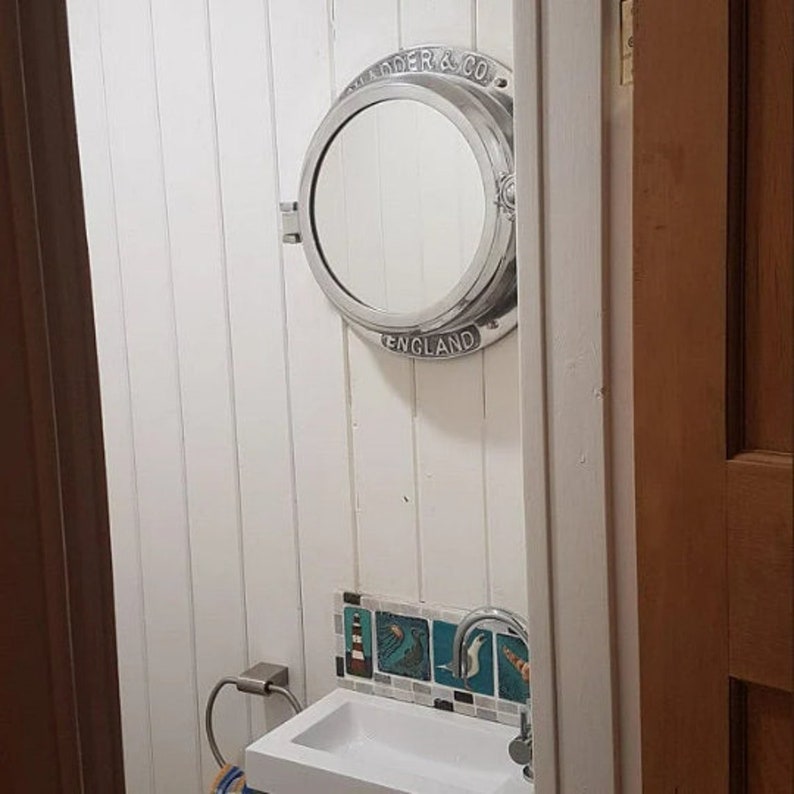 Nickel plated round ship porthole mirror with functional hinge