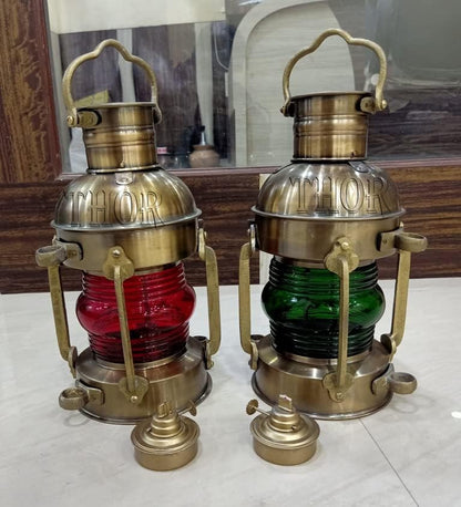 Close-up of oil-powered antique naval lantern with iron and glass construction