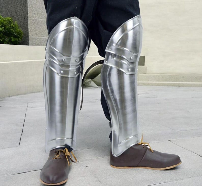Front view of Polished Steel Knight Greaves showing full medieval leg armor design