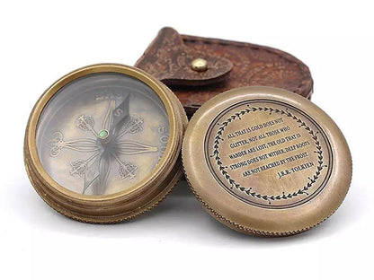 Main view of RII brass pocket compass engraved with “Not all who wander are lost” quote