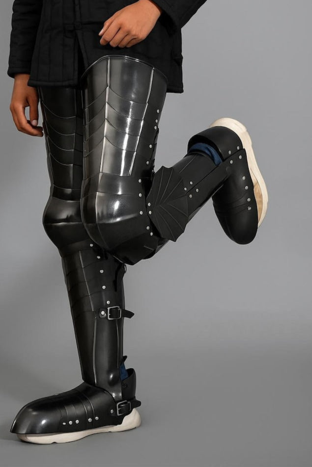 Side profile of Ringwraith Leg Armor Set showing adjustable leather straps
