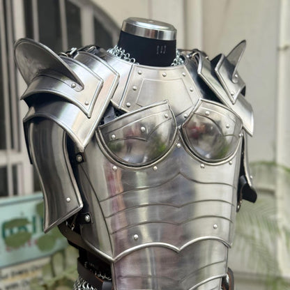 Woman wearing SCA reenactment armor set with detailed shoulder pauldrons and gorget