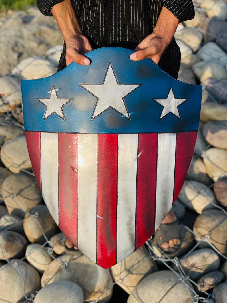 Captain America shield for cosplay, featuring iconic star and patriotic design.
