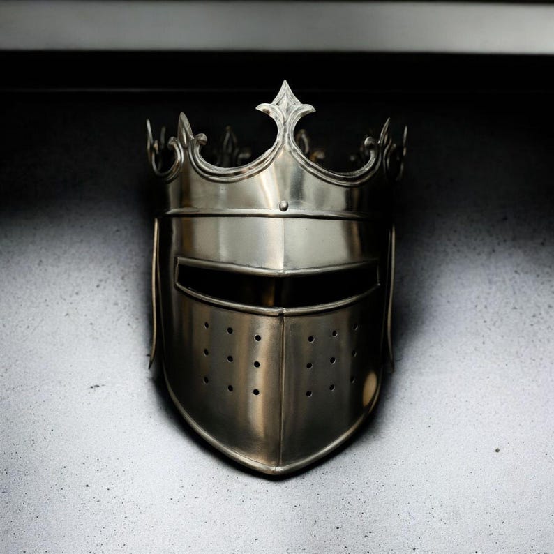 Medieval crown helmet on stand for historical display or reenactment setup