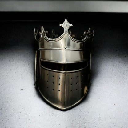 Medieval crown helmet on stand for historical display or reenactment setup