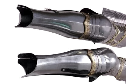 Side angle of warrior armor showing steel leg greaves and chest cuirass in gothic style

