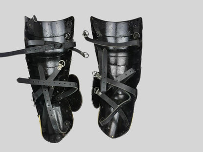 Side profile of articulated Polish Winged Hussar Leg Armor with swivel rivet design

