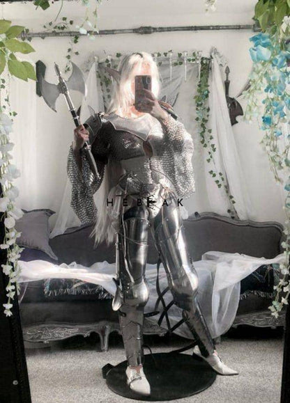 Side angle of the Royal Valkyrie armor showing articulated pauldrons, layered chainmail, and full arm protection in authentic medieval style.

