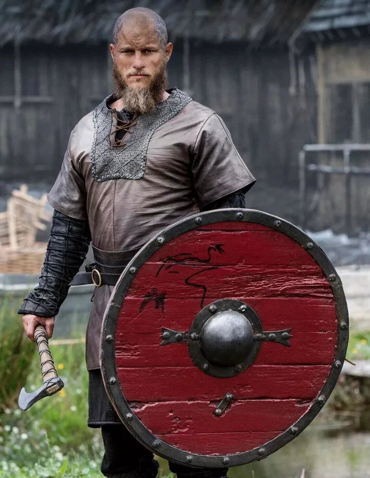 Front view of 22-inch red Viking wooden shield with Norse round design