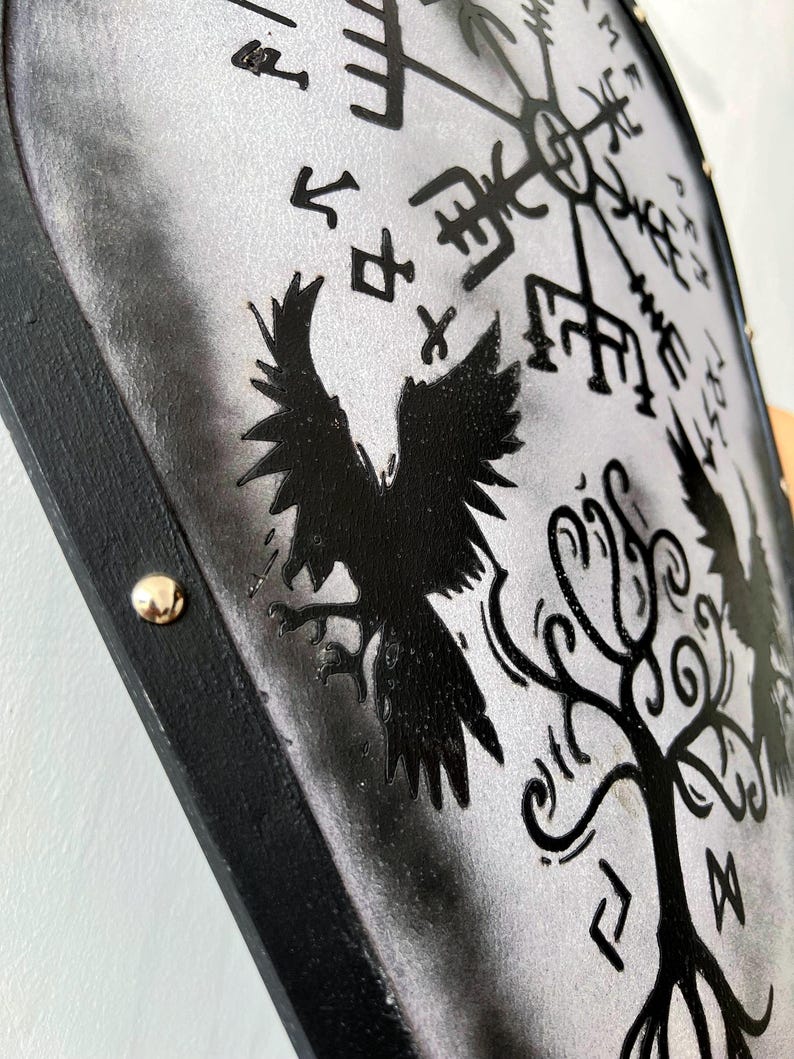 Viking shield wall decor featuring Yggdrasil tree design